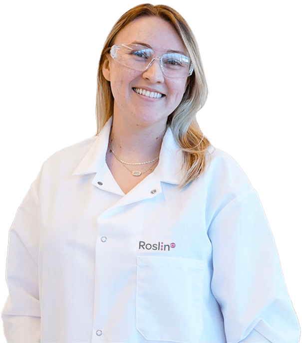 RoslinCT-smiling-scientist-in-lab